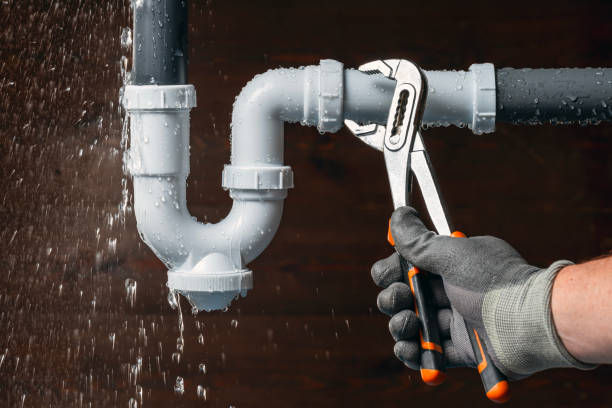 Professional Emergency Plumber technician working in Castalia, OH
